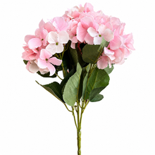 Load image into Gallery viewer, A bouquet of artificial pink hydrangea flowers with green leaves and stems, isolated on a white background.