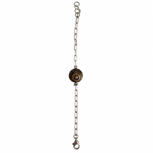Charger l'image dans la galerie, A vintage-style gun barrel pendant chain accessory with a silver-toned metal link chain, a round bullet-shaped pendant featuring a gold-toned center, and a lobster clasp at the bottom, shown against a plain white background.