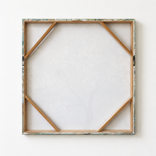 Load image into Gallery viewer, A square canvas art print with a rustic, distressed wooden frame. The frame features a weathered, peeling paint finish in muted tones of teal, brown, and beige, with visible wooden support beams inside.
