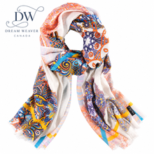 Load image into Gallery viewer, A multicolor patterned scarf with fringed ends, featuring abstract and paisley-like designs in orange, blue, yellow, purple, and white. The brand logo 'Dream Weaver Canada' is visible in the top left corner.
