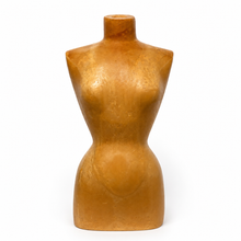 Load image into Gallery viewer, A small sculptural female torso mannequin in a warm ochre-brown color, photographed against a clean white background.
