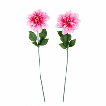 Charger l'image dans la galerie, Two artificial pink dahlia flowers with green stems and leaves, displayed against a solid white background.
