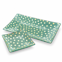 Load image into Gallery viewer, Two rectangular glass serving trays with rounded corners, featuring a mint green background with a pattern of gold and cream polka dots, shown on a white background.
