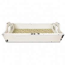 Charger l'image dans la galerie, A rectangular distressed white wooden serving tray with two handles and a gold geometric patterned interior, shown on a plain white background.

