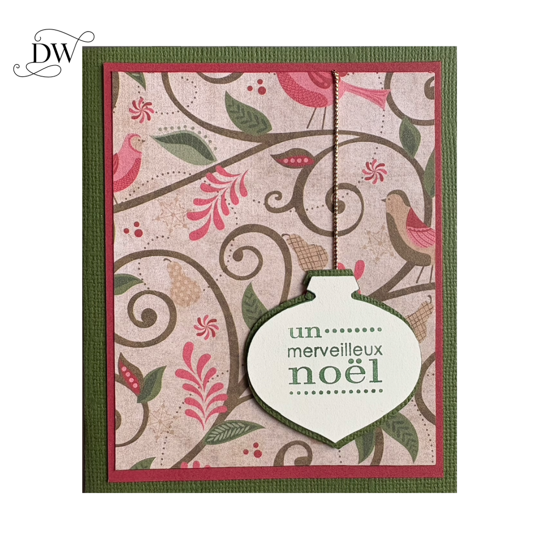 Handmade French Christmas Card with “un merveilleux Noël” text and red green floral design