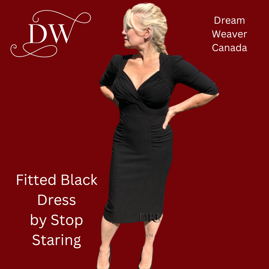Stop staring top black dress